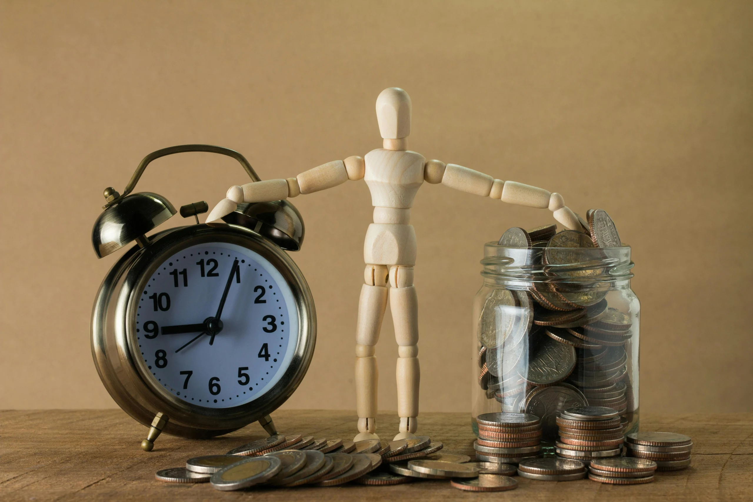 a man holding a clock and a jar of coins, representing the amount of time it takes before a website begins showing up on google
